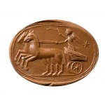 A postclassical Near Eastern agate engraved scarab. Victory on a biga.