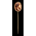 A three-layered agate cameo set in a gold stick pin. Bust of Zeus.