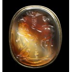 A large agate intaglio set in a gold ring. Allegorical scene.