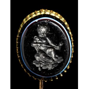 A dark glass paste impression set in a gold stick pin. Hercules as a child killing the snakes