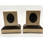 Two Roman-style book coasters with designs of emperors