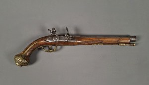 Pistola con serratura a bilanciere, XVIII secolo.