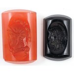 TWO GEMMAS WITH HEADS IN HELMETS