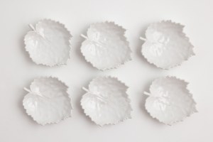 SEI PATTERNS CON FORMA DI FOGLIA, Germania, Berlino, KPM, XX secolo.