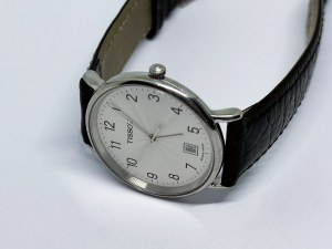 Tissot 33.5 mm men's/unisex watch, original strap and decal on the caseback
