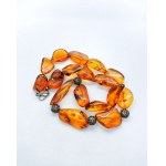 Gorgeous transparent natural amber necklace with openwork elements
