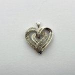 Silver heart pendant with Diamonds approximately 0.50 Ct