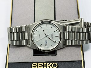 Seiko SQ100 35mm men's watch with original Seiko box