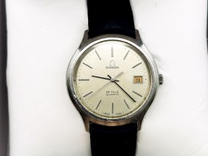 Omega De Ville Quartz men's watch orange date 35 mm.