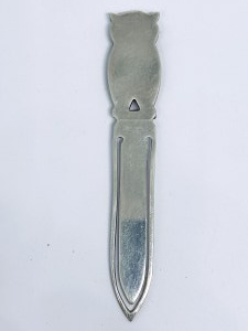 Silver bookmark in the shape of an owl