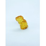 Hand carved owl figurine of natural transparent Baltic amber