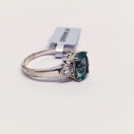 Silver ring with natural fluorite and topazes