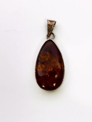 Silver pendant with amber