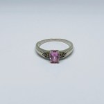 Silver ring with white sapphires and pink zirconia