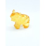 Hand-carved translucent elephant figurine made of natural Baltic amber
