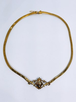 Gold necklace in baroque style