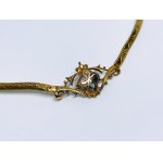Gold necklace in baroque style