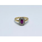 Gold ring with natural ruby and diamonds