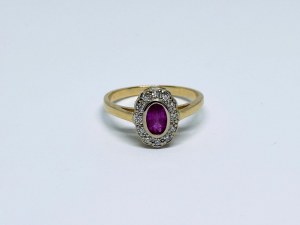 Gold ring with natural ruby and diamonds