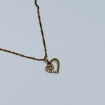 375/9K gold heart necklace with Zircons.