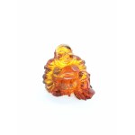 Hand-carved transparent Buddha figurine made of natural Baltic amber