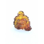 Hand-carved transparent Buddha figurine made of natural Baltic amber