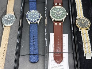 Set of 4 quartz watches in boxes
