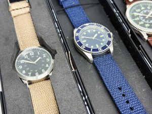 Set of 4 quartz watches in boxes