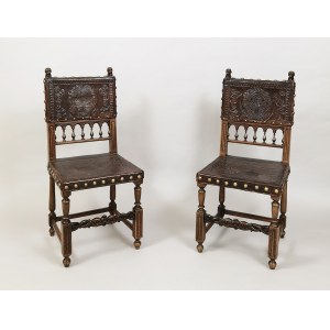 A pair of eclectic style chairs