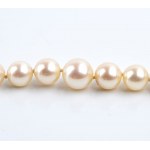 Gold emerald pearl necklace