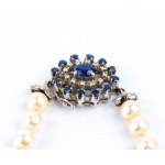 Pearl necklace and gold brooch with diamonds and sapphires