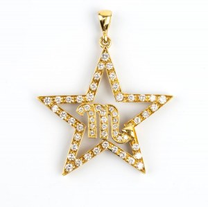 Gold pendant with diamond zodiac symbol
