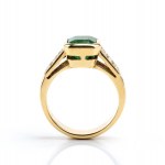 Gold emerald and diamond ring