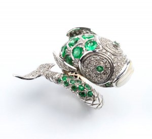 Gold fish-shaped ring with diamonds and emeralds