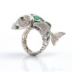 Gold fish-shaped ring with diamonds and emeralds