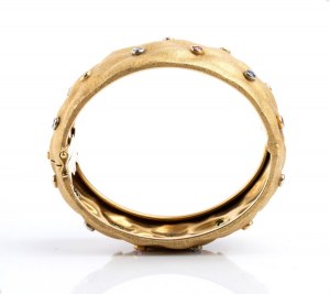 Gold bracelet with precious stones