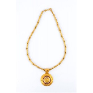 Gold archaeological-style necklace with precious stones