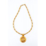 Gold archaeological-style necklace with precious stones