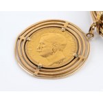 Gold bracelet with a pendant pound