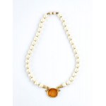 Gold, diamonds, emeralds, carnelian intaglio, imitation pearl necklace