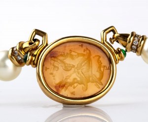 Gold, diamonds, emeralds, carnelian intaglio, imitation pearl necklace