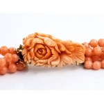 Pink shell and necklace with gold clasp