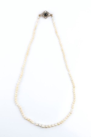 Freshwater pearl necklace with gold and silver clasp