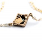 Freshwater pearl necklace with gold and silver clasp