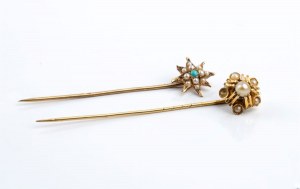 Two gold pins
