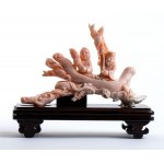 A PINK CORAL SCULPTURE