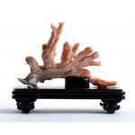 A PINK CORAL SCULPTURE