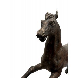 Solid silver horse with wooden base