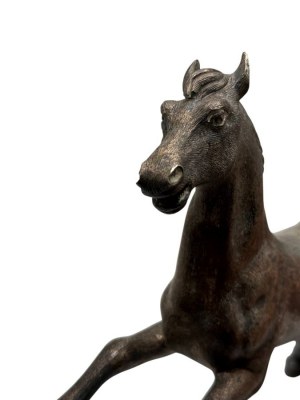 Solid silver horse with wooden base