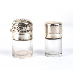 A pair of cut crystal and sterling silver bottles